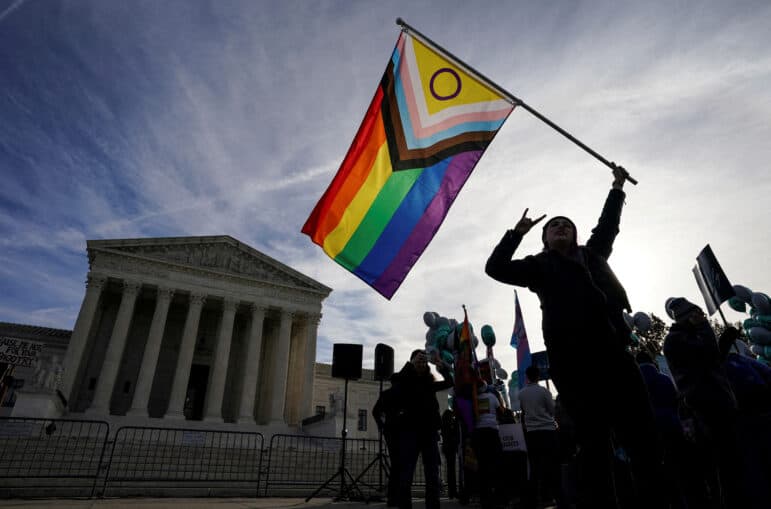 file photo: activists gather outside u.s. supreme court as justices hear arguments in case involving lgbt rights in washington